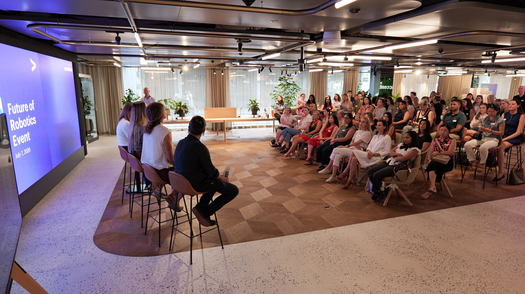 Audience at a robotics community event
